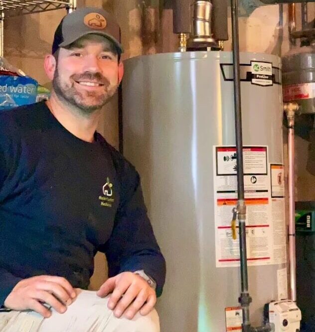 Jeff sitting by a newly installed water heater